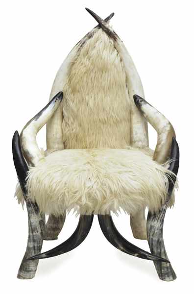 Appraisal: A PAIR OF ARMCHAIRS animal hide horns