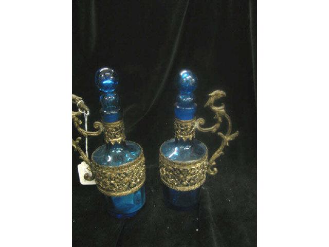 Appraisal: Pair of Blue Art Glass Cruets fancy metal holders