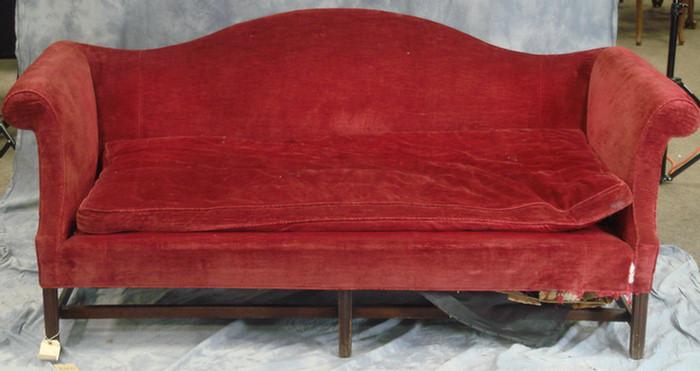 Appraisal: Mahogany Chippendale stretcher base sofa with serpentine crestrail and rolled