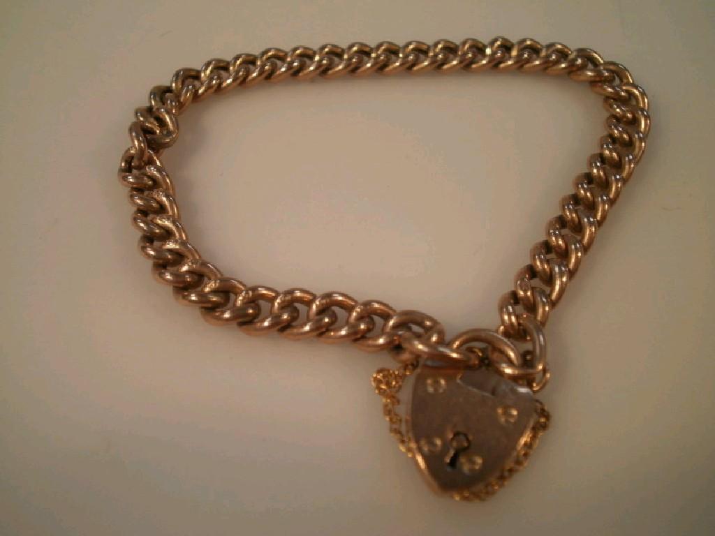 Appraisal: A ct curb link bracelet with padlock clasp g