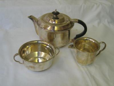 Appraisal: A THREE PIECE TEA SET of circular form the domed