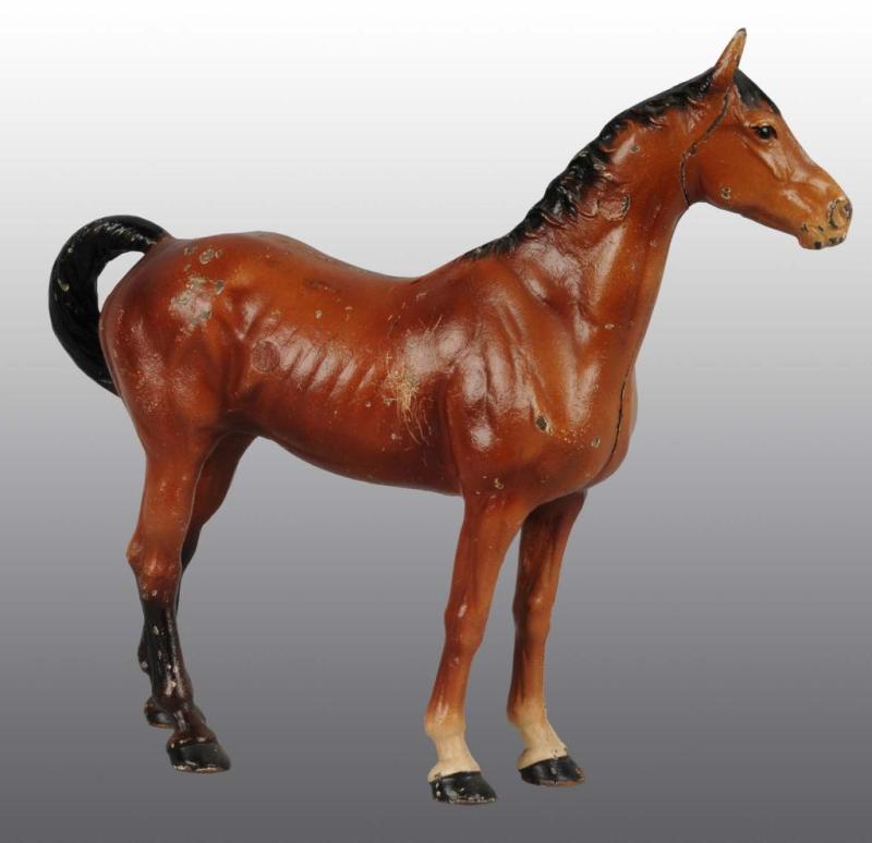 Appraisal: Cast Iron Large Horse Doorstop Description Made by Hubley cat