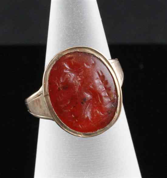 Appraisal: An antique gold and intaglio ring of oval form with