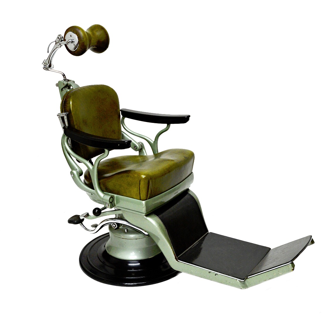 Appraisal: Sterling Sapphire a s dentist's chair with green leather upholstery