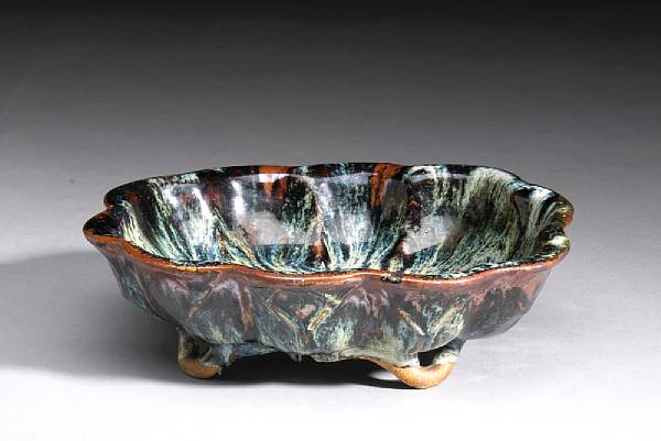 Appraisal: A flambe glazed ceramic bowl Late Qing Republic Perod Fashioned