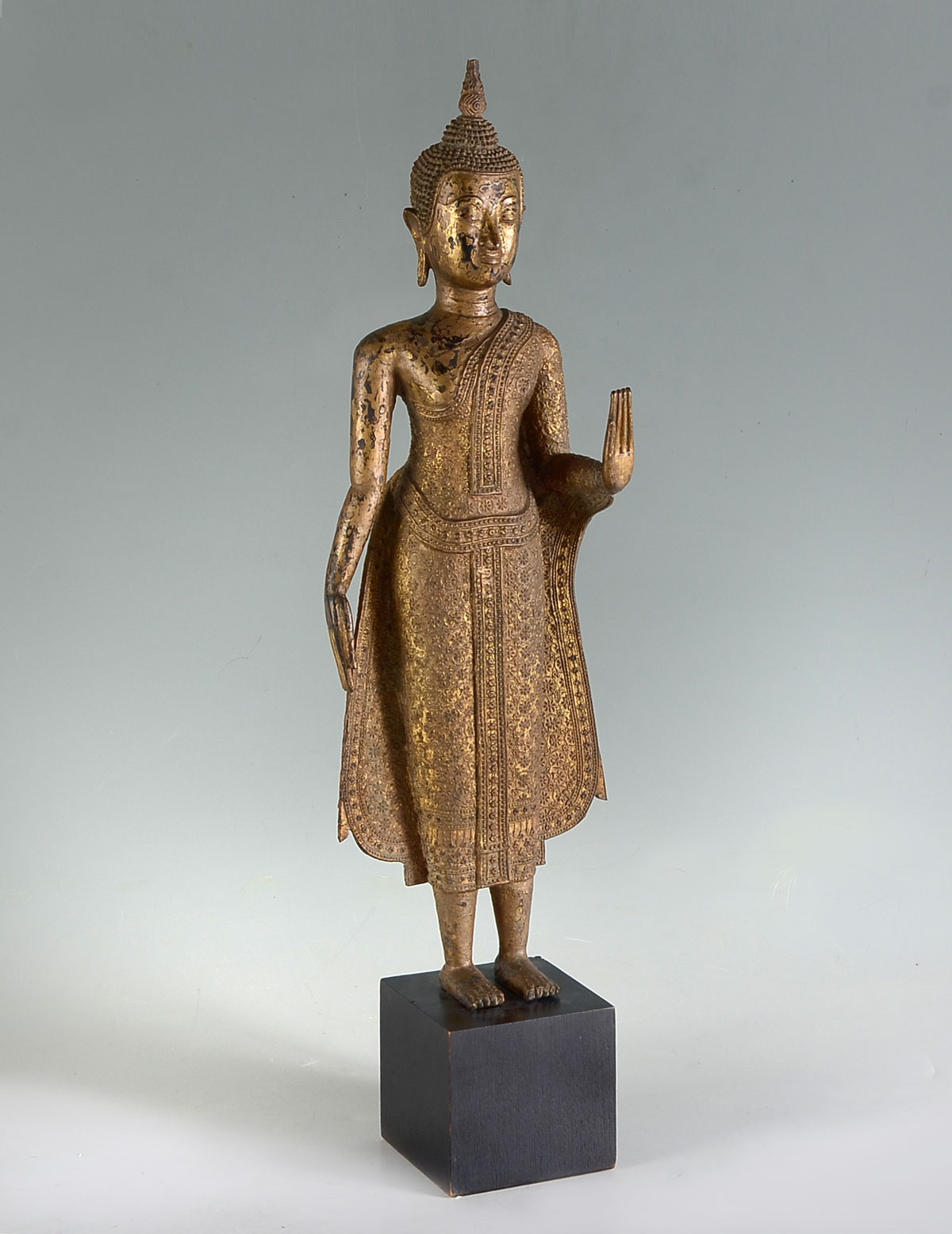 Appraisal: TALL TH C GILT BRONZE THAI BUDDHA Heavy early Gilt