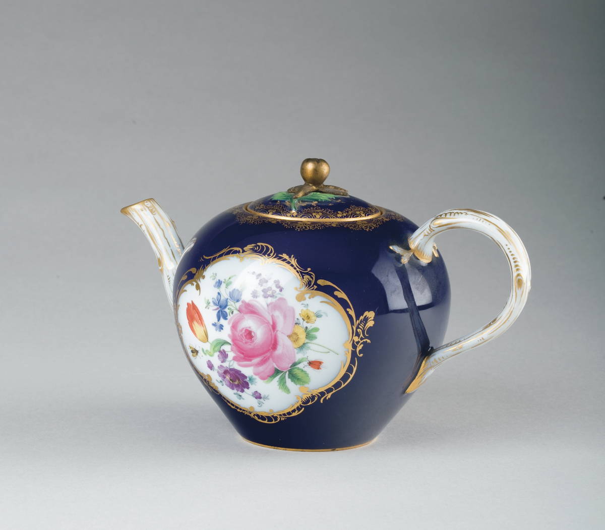 Appraisal: MEISSEN PORCELAIN COBALT BLUE-GROUND BULLET-FORM TEAPOT AND COVER MID-LATE NINETEENTH