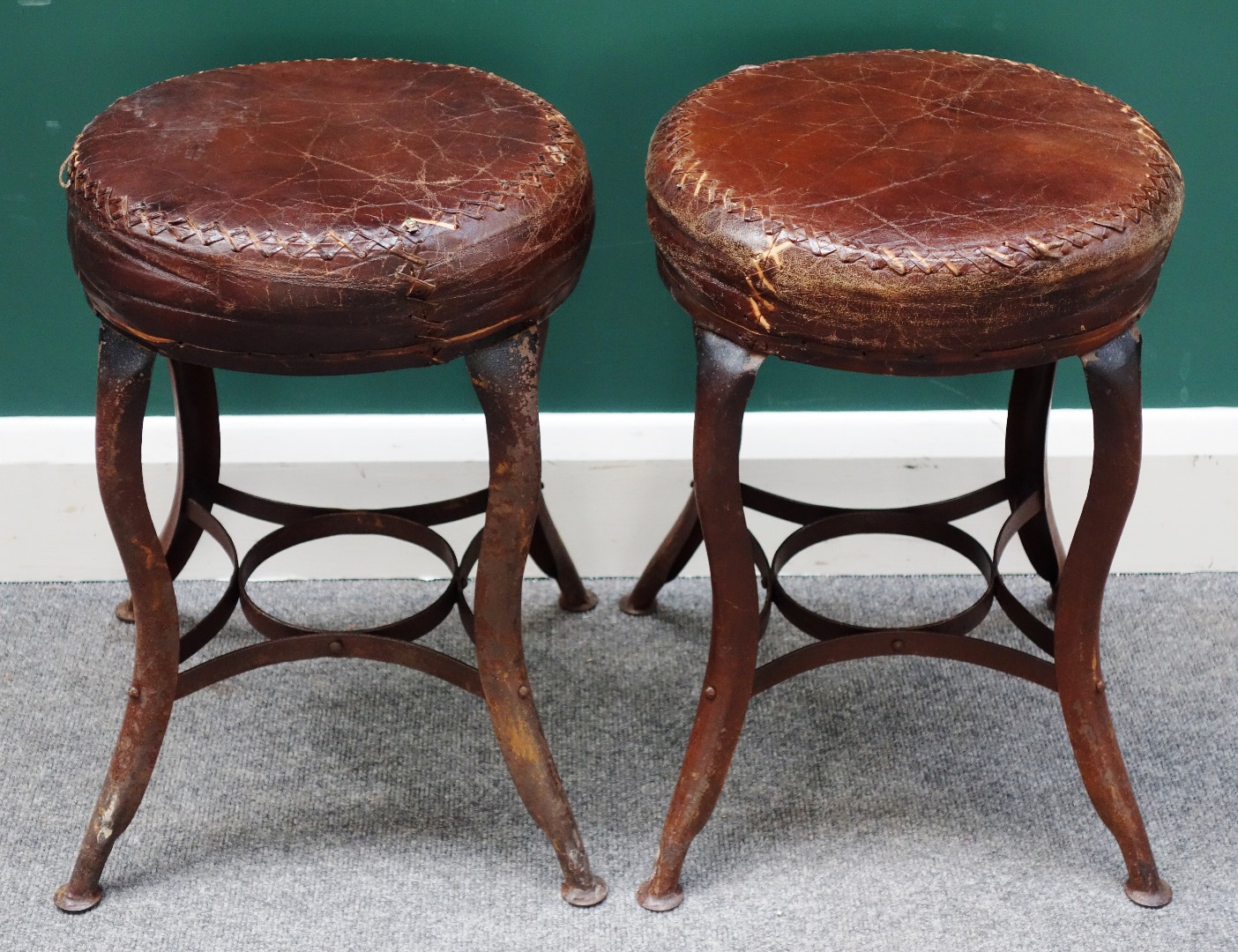 Appraisal: A pair of mid- th century French leather top circular