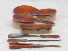 Appraisal: A seven piece French silver and red enamel brush set