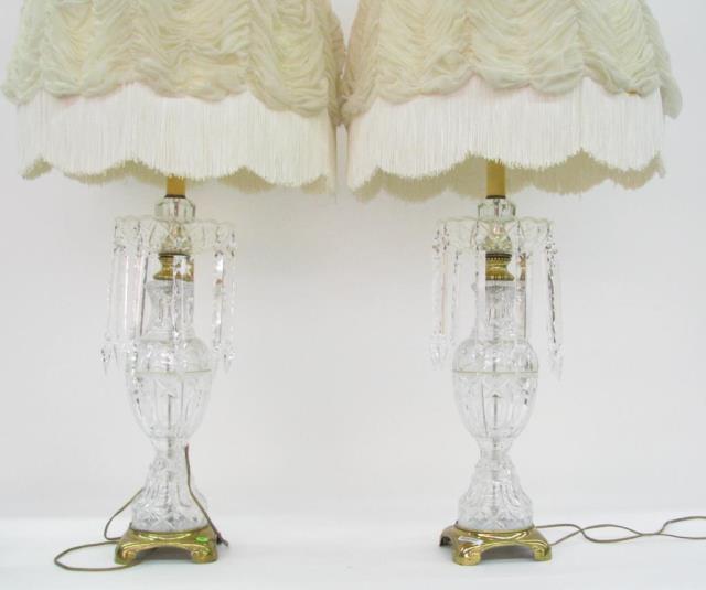 Appraisal: A pair of brass and crystal table lamps with crystal