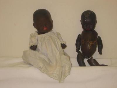 Appraisal: An Armand Marseille bisque head black baby doll repaired head