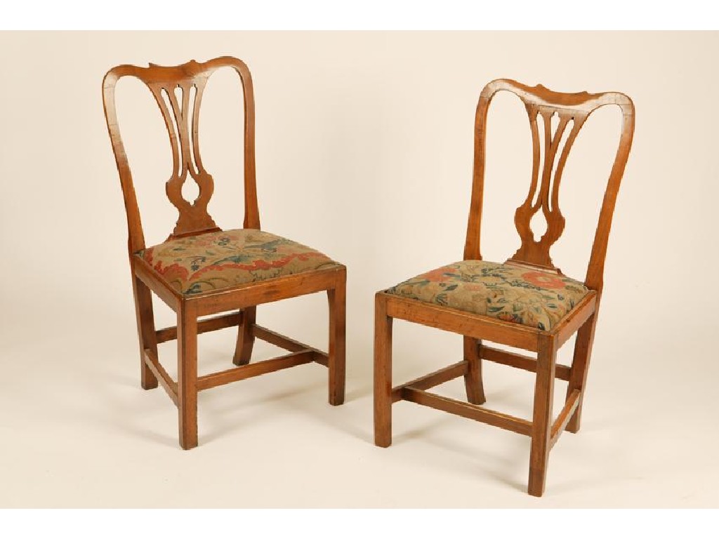 Appraisal: A PAIR OF GEORGE III FRUITWOOD CHAIRS of Chippendale design