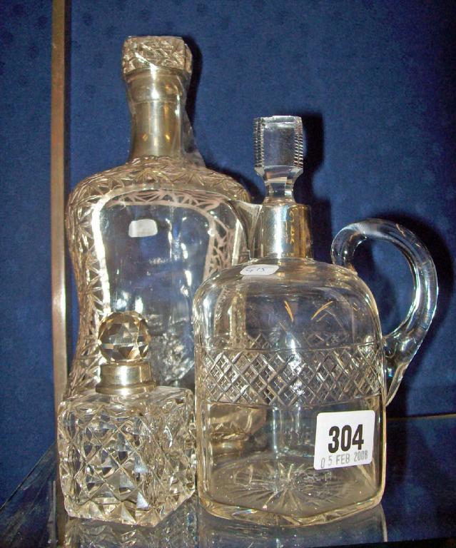 Appraisal: A silver mounted spirit flask and two similar items -