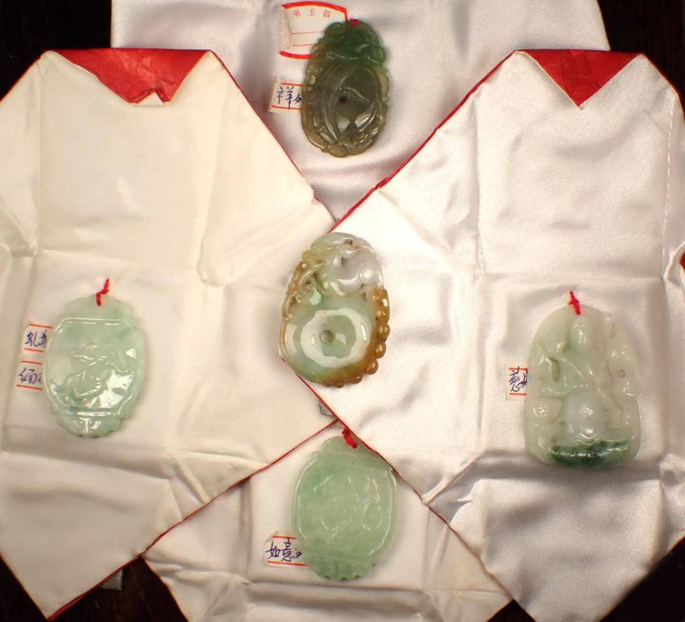 Appraisal: FIVE CHINESE CARVED JADE PENDANTS of various size colors the