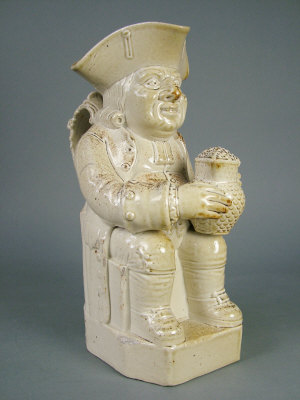 Appraisal: Large salt glazed Toby Jug the figure seated holding a