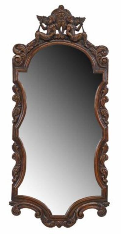 Appraisal: English carved oak mirror th c cherubim crest over shaped