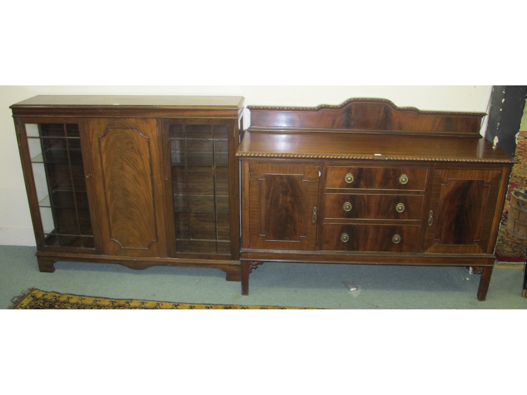 Appraisal: Mahogany bookcase and sideboard