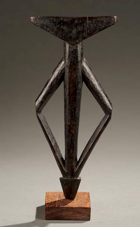 Appraisal: Mossi wooden flute th century A wooden flute Burkina Faso