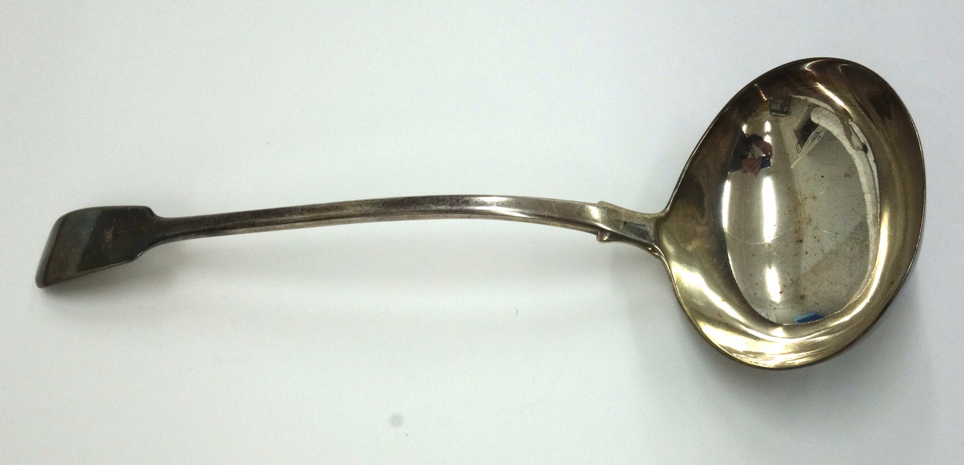 Appraisal: A George IV silver fiddle pattern soup ladle William Chawner