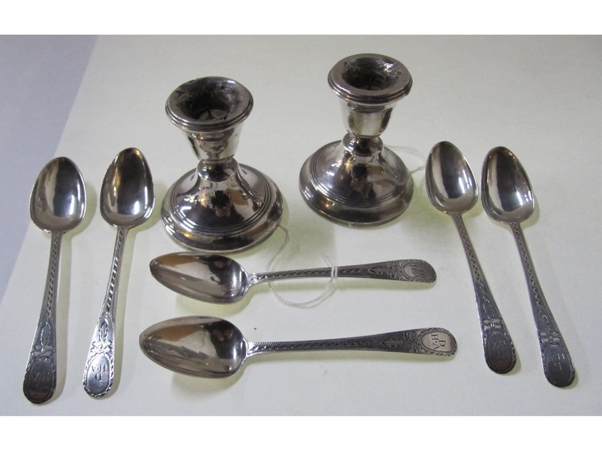 Appraisal: A lot comprising a pair of silver candlesticks Birmingham and