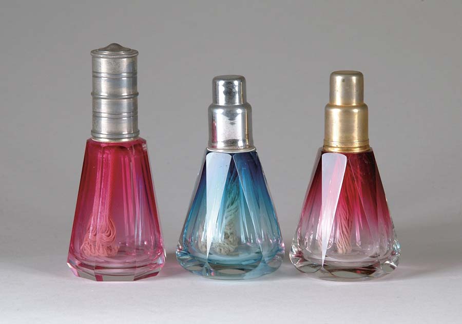 Appraisal: SET OF THREE PERFUME BURNERS One perfume burner is cranberry