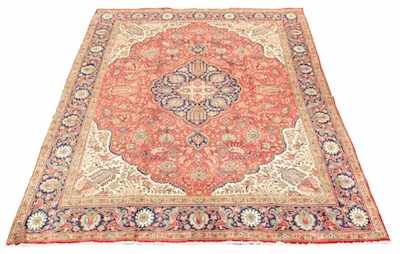 Appraisal: A Tabriz Carpet Central medallion in blue with extensions in