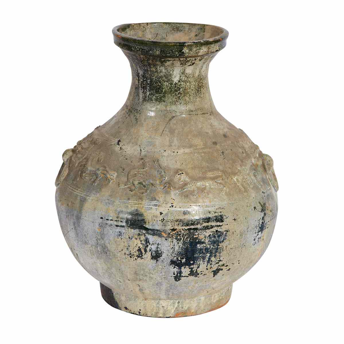 Appraisal: Olive glazed Amphora The bulging sides moulded with stylized mythical