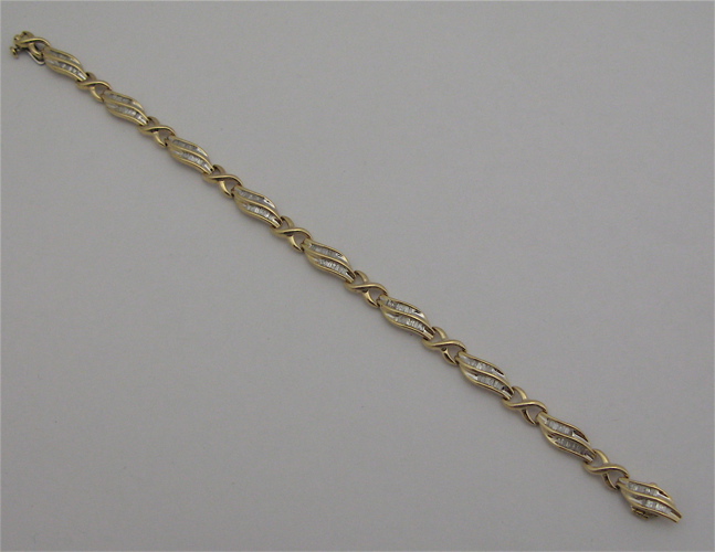 Appraisal: DIAMOND AND KARAT GOLD BRACELET - in length with nine