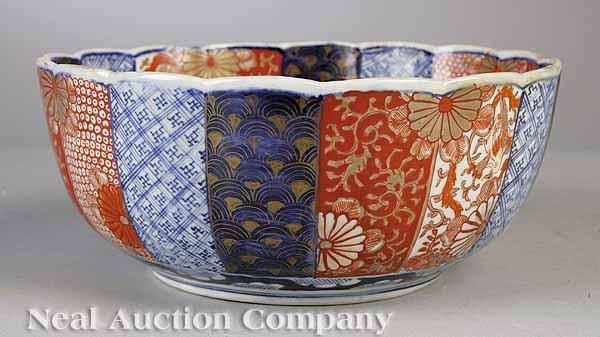 Appraisal: An Antique Japanese Imari Porcelain Bowl with scalloped rim paired