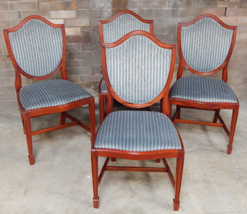 Appraisal: A set of four thC mahogany Hepplewhite design shield back