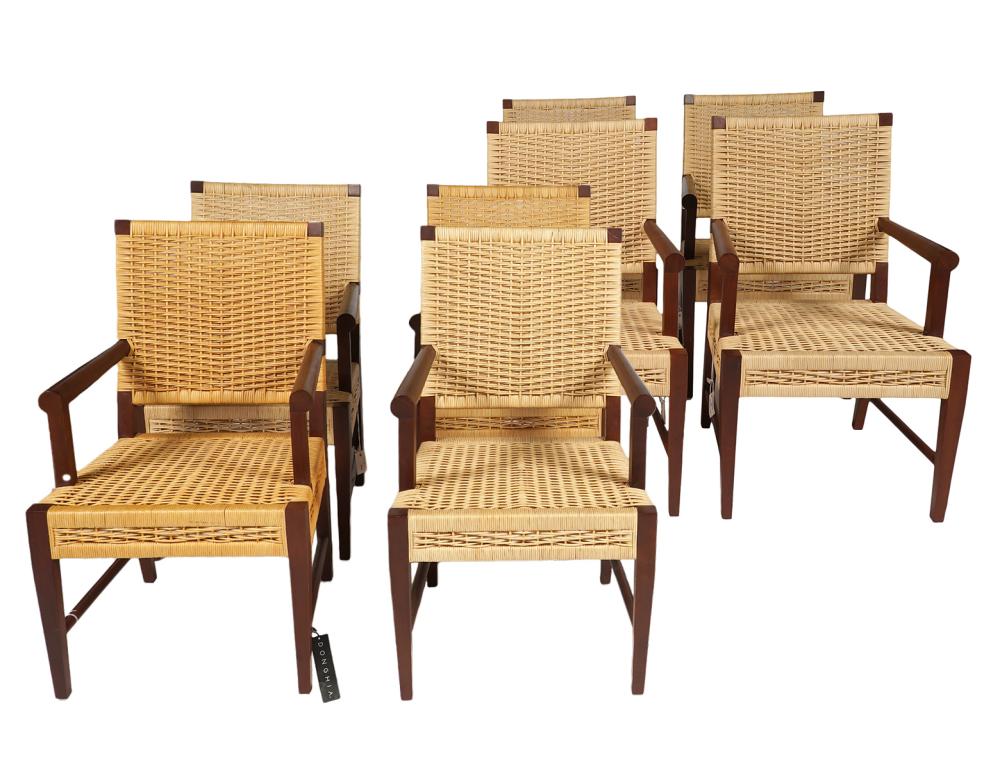 Appraisal: DONGHIA MERBAU WOOD AND RAFFIA CHAIRS Donghia Merbau wood and