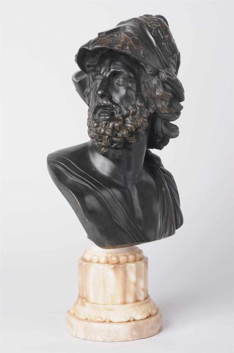 Appraisal: BRONZE BUST OF MINELEAS AFTER THE ANTIQUE The bearded head