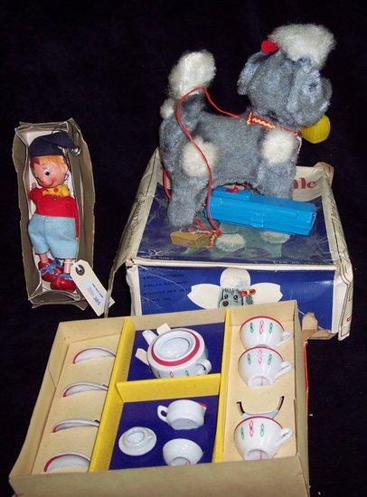 Appraisal: A doll's tea set for four boxed together with a