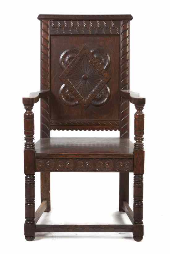 Appraisal: A Renaissance Revival Carved Oak Hall Chair the straight crest