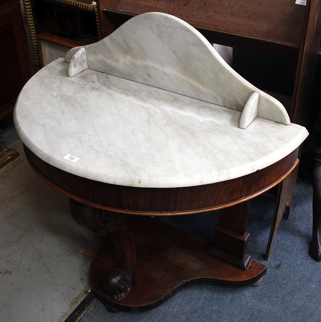 Appraisal: A VICTORIAN DEMI LUNE MARBLE TOPPED SIDE TABLE cm wide