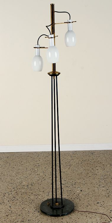 Appraisal: ITALIAN IRON BRASS THREE LIGHT FLOOR LAMP C An Italian