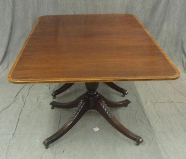 Appraisal: BAKER Mahogany Banded Dining Table Beautiful quality table with carved