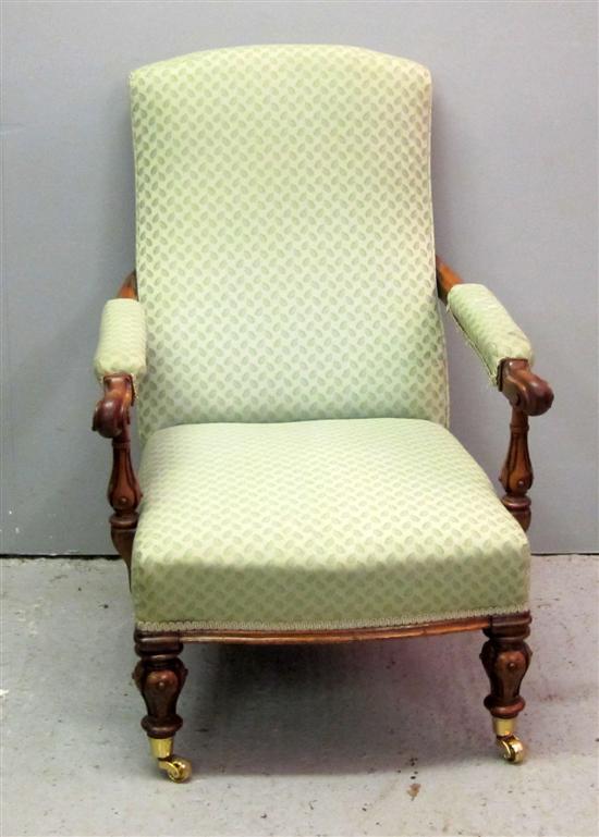 Appraisal: th century French walnut arm chair padded back and seat