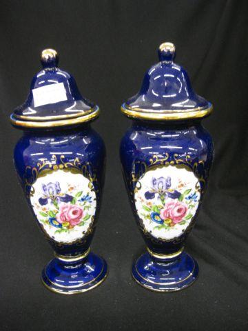 Appraisal: Pair of Porcelain Urns cobalt and gold with medallion of