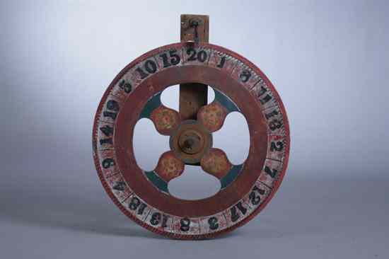 Appraisal: NORTH CAROLINA CARNIVAL GAME WHEEL Early-to-mid th century Hand-painted polychrome