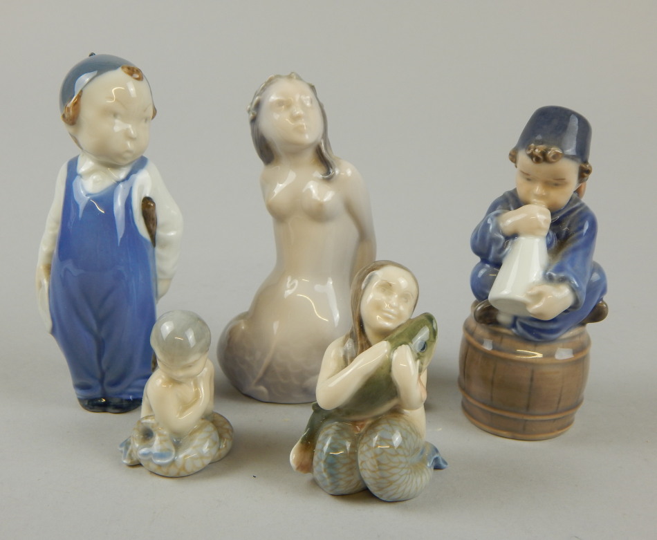 Appraisal: A group of five Royal Copenhagen figures to include three