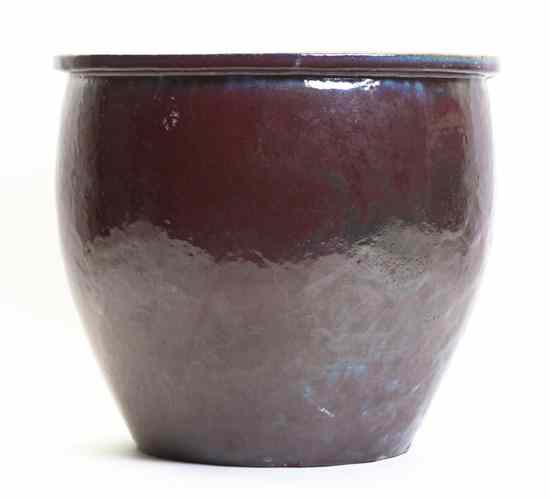 Appraisal: An Oxblood Glazed Jardiniere of globular form Diameter inches