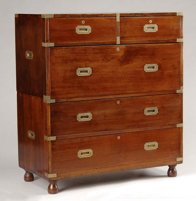 Appraisal: TWO PART MAHOGANY CAMPAIGN CHEST The top section having a