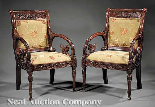 Appraisal: A Pair of Continental Highly Carved Mahogany Fauteuils reeded and