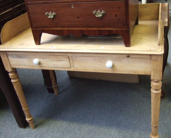 Appraisal: A th century pine wash stand the three quarter gallery