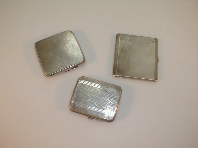 Appraisal: Three engine turned silver cigarette cases