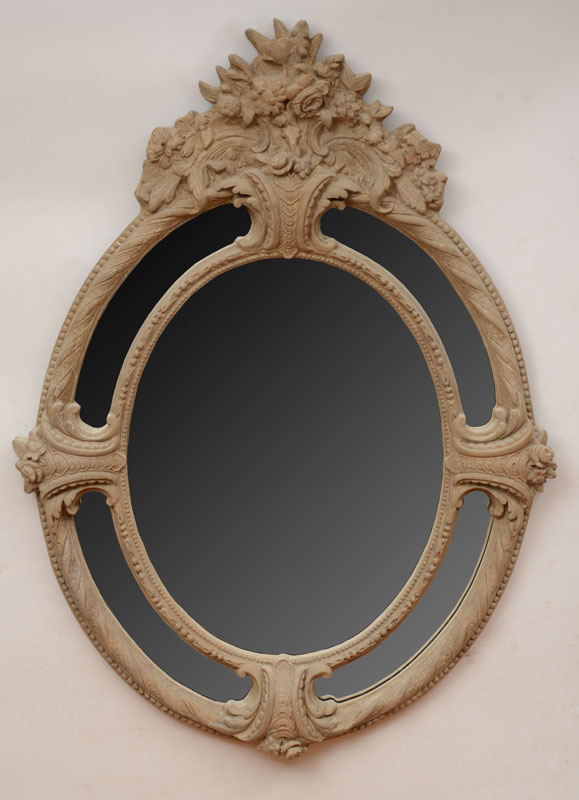 Appraisal: Baroque Style Cast Composition Oval Mirror ft in x in