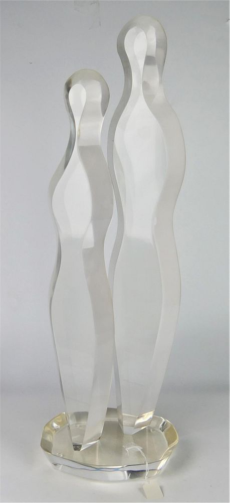 Appraisal: LARGE LUCITE SCULTURE OF A MAN AND WOMAN No signature