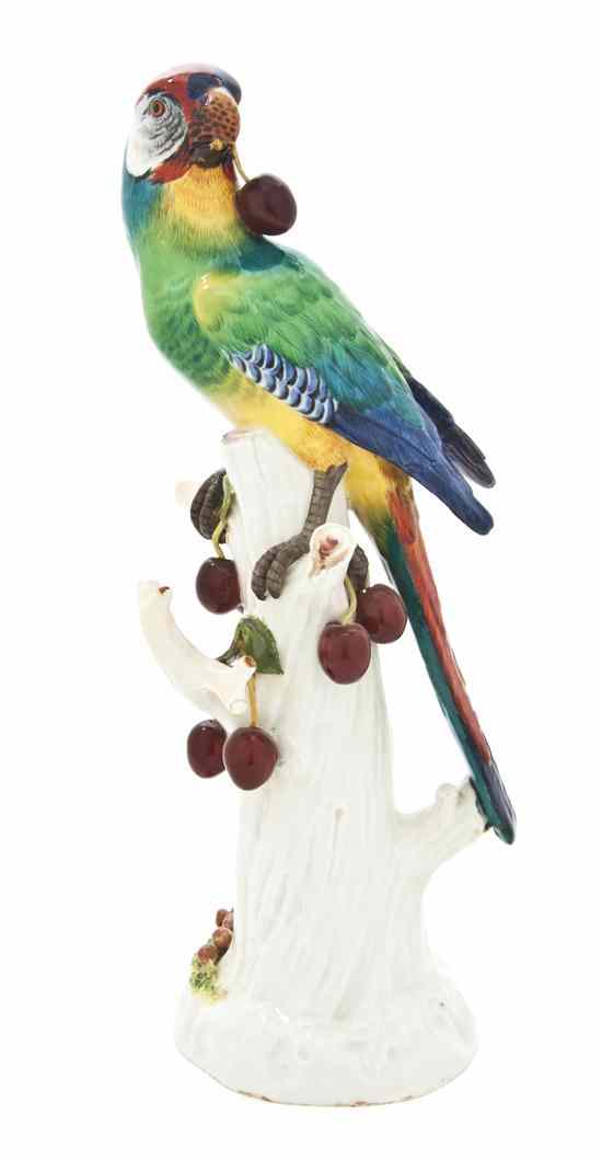 Appraisal: A Meissen Porcelain Figure depicting a parrot surmounted on a