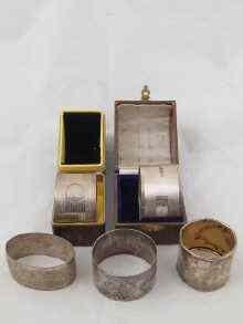 Appraisal: Five silver napkin rings being three hallmarked one continental grade